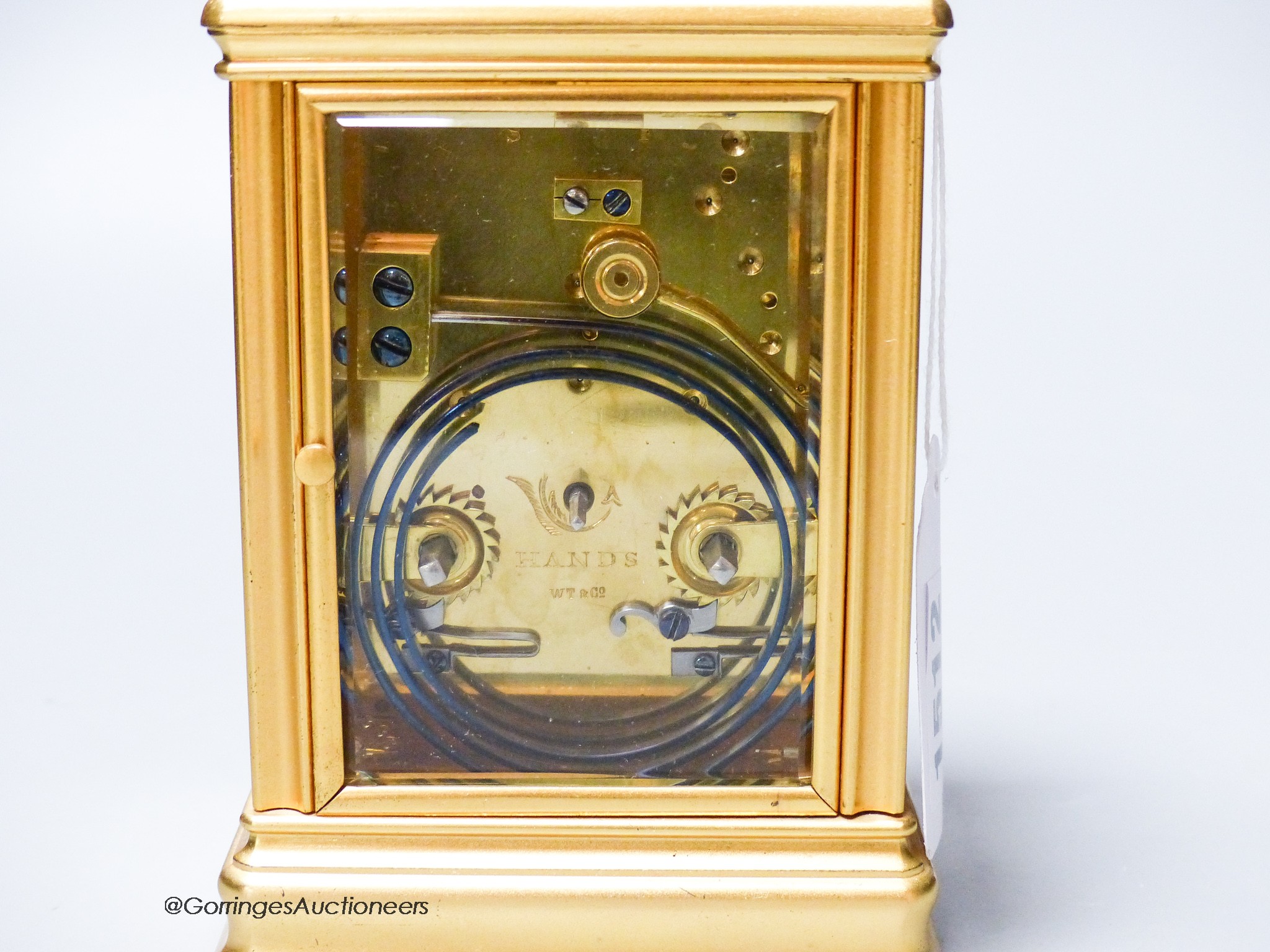 A large French brass repeating carriage clock, retailed by W. Thornhill & Company, 144 & 145 New Bond St, London, 15cm high., with case